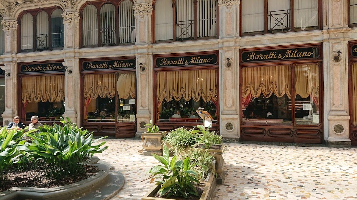Baratti & Milano - Established in 1858, this cafe was awarded the title of "Official Supplier of the Royal House of Savoy". Order: cremino, or a foil-wrapped Gianduiotto and a dark Piedmotese coffee