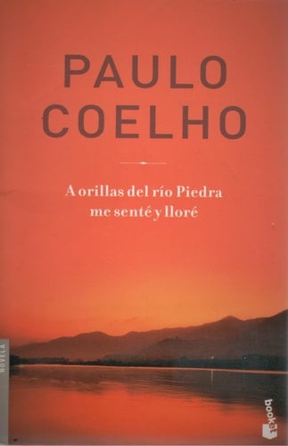 A Orillas Del Rio Piedra Me Sente Y Llore - Paulo Coelho • 2002