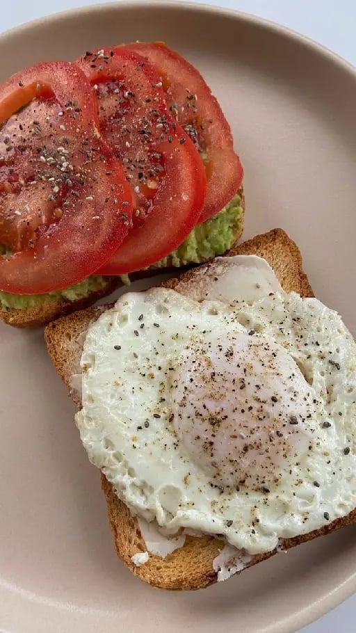 toast - sooo simple, toast your bread, fry an egg (don''t forget the salt and pepper) smash your avo and spread it in your toast, add juicy tomato slices on the top !!