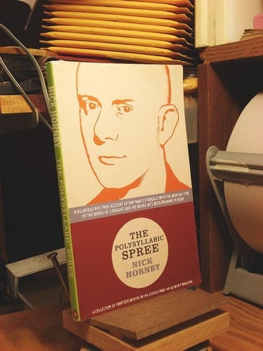 The Polysyllabic Spree: A Hilarious and True Account of One Man's Struggle with the Monthly Tide of the Books He's Bought and the Books He's Been Meaning to Read - Nick Hornby · 2004