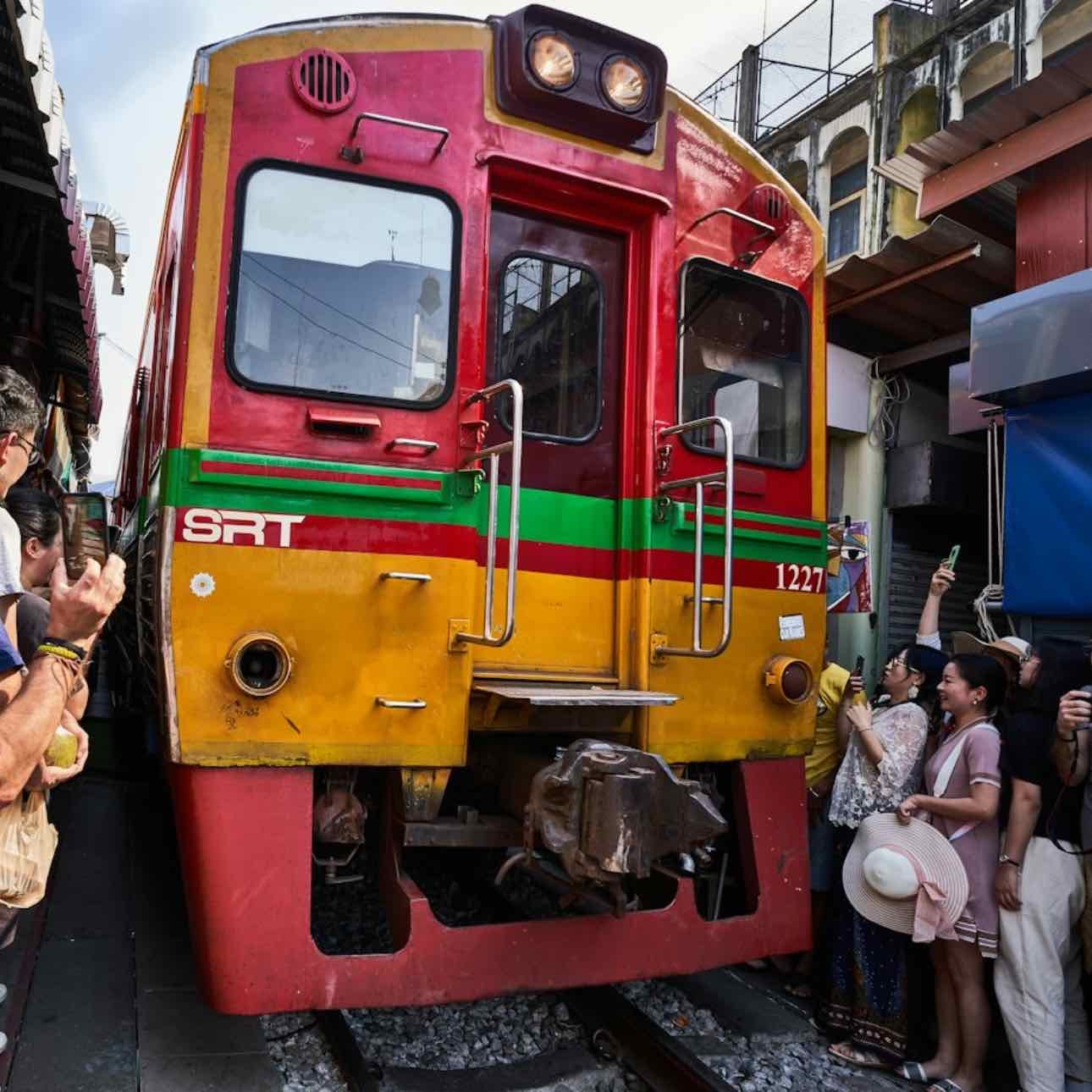 Maeklong Railway Market - Market on a railway track for fresh food and drink
