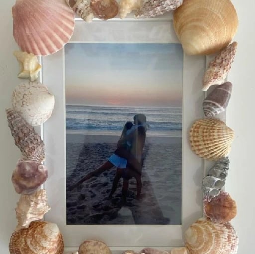 Decorated photo frame - Not only with snails but also with beads, things made of porcelain, among others
