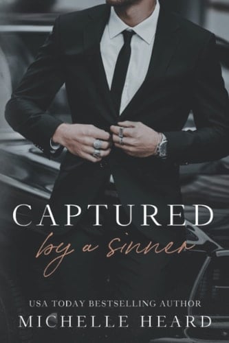 Captured By A Sinner (The Sinners Series) - Michelle Heard · 2022