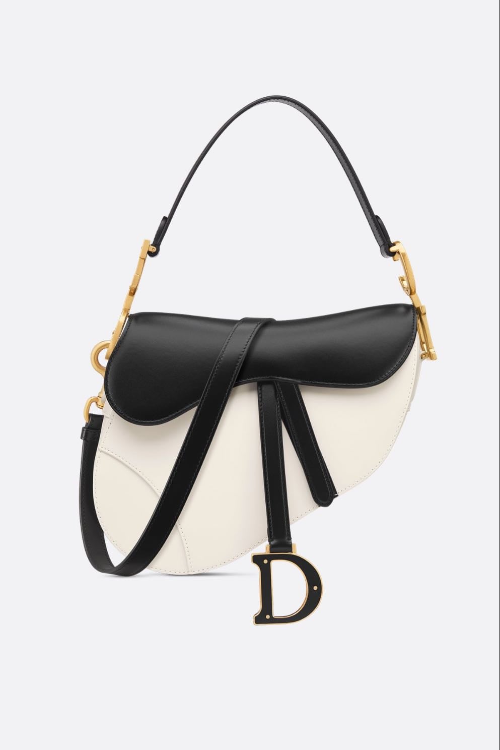 Dior Bolso Saddle con bandolera - Piel de becerro flexible en dos tonos, latte y negro.
€4000