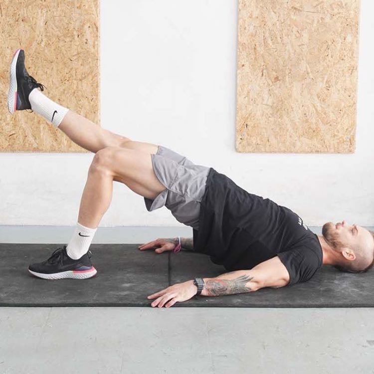 One leg glute bridge - Perform this exercise one leg at a time: the weight is on the only heel that is on the floor, think about your glute & hamstring working, the other leg is up in the air, keep it straight if possible.