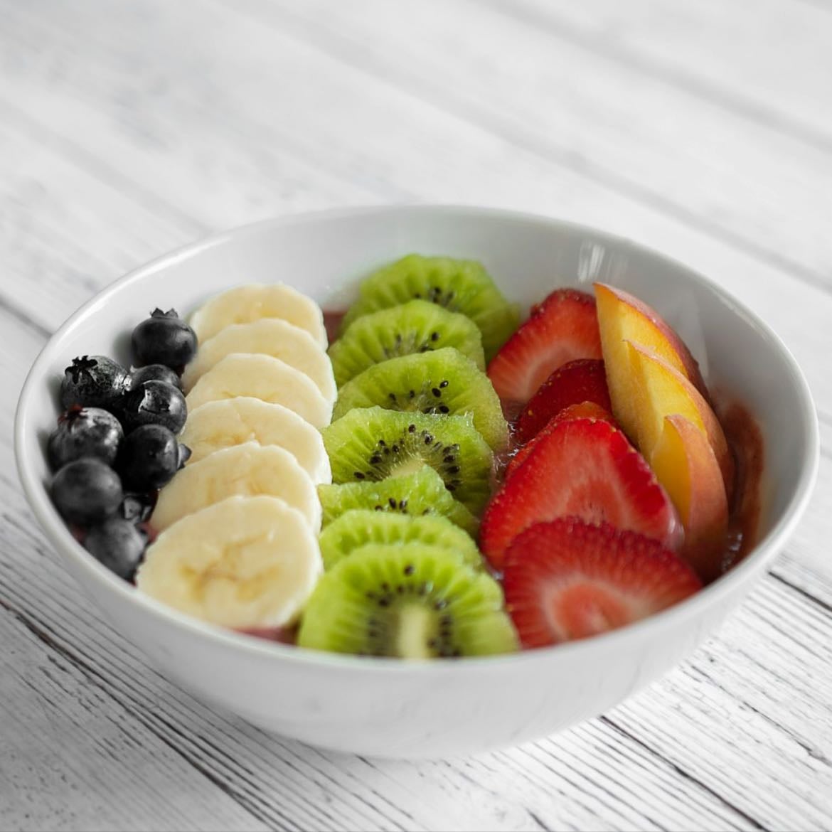 Iogurte & fruta - • 1/2 copo de iogurte probiótico
• 1 fruta
• 1 colher de sopa de aveia flocos finos