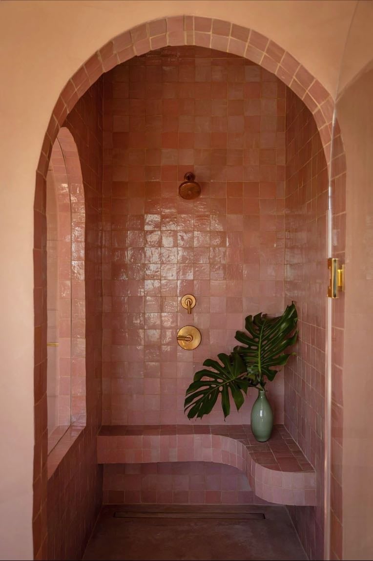 Pink tiled shower