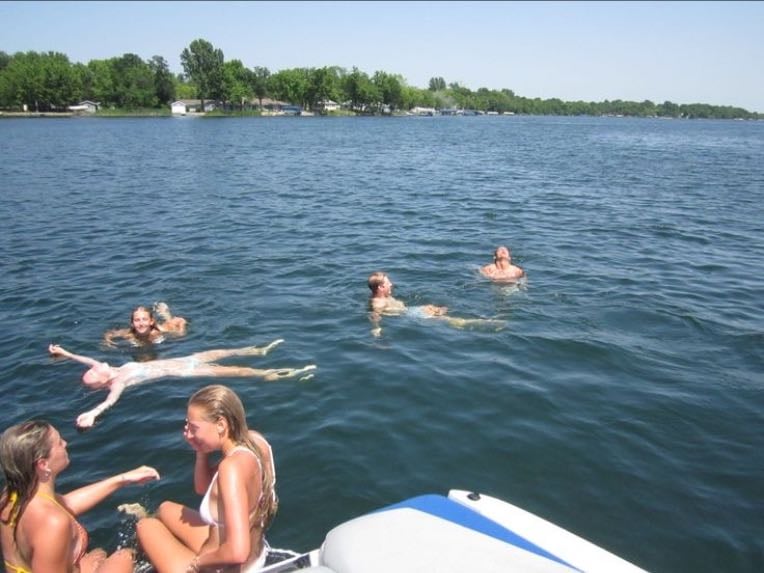 Tan next to the lake