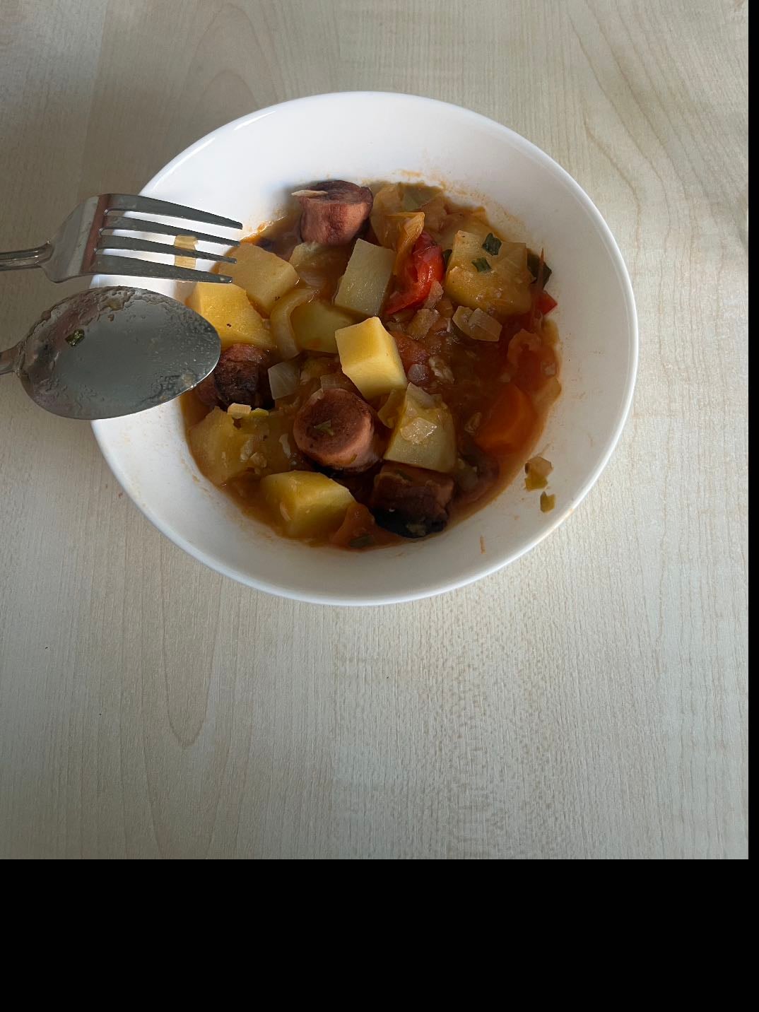 Vegetable soup with sausages