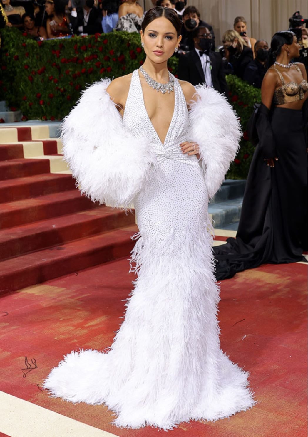 eiza gonzález - custom michael kors
an optic white gown with scattered crystals, paired with a matching feather jacket