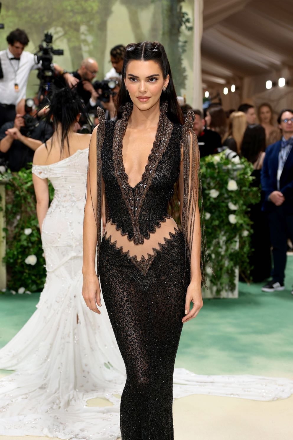 kendall jenner - vintage givenchy
designed by alexander mcqueen. a dress with unique cutouts at the hips and a sculptural collar. an archival dress from the fall 1999 collection.