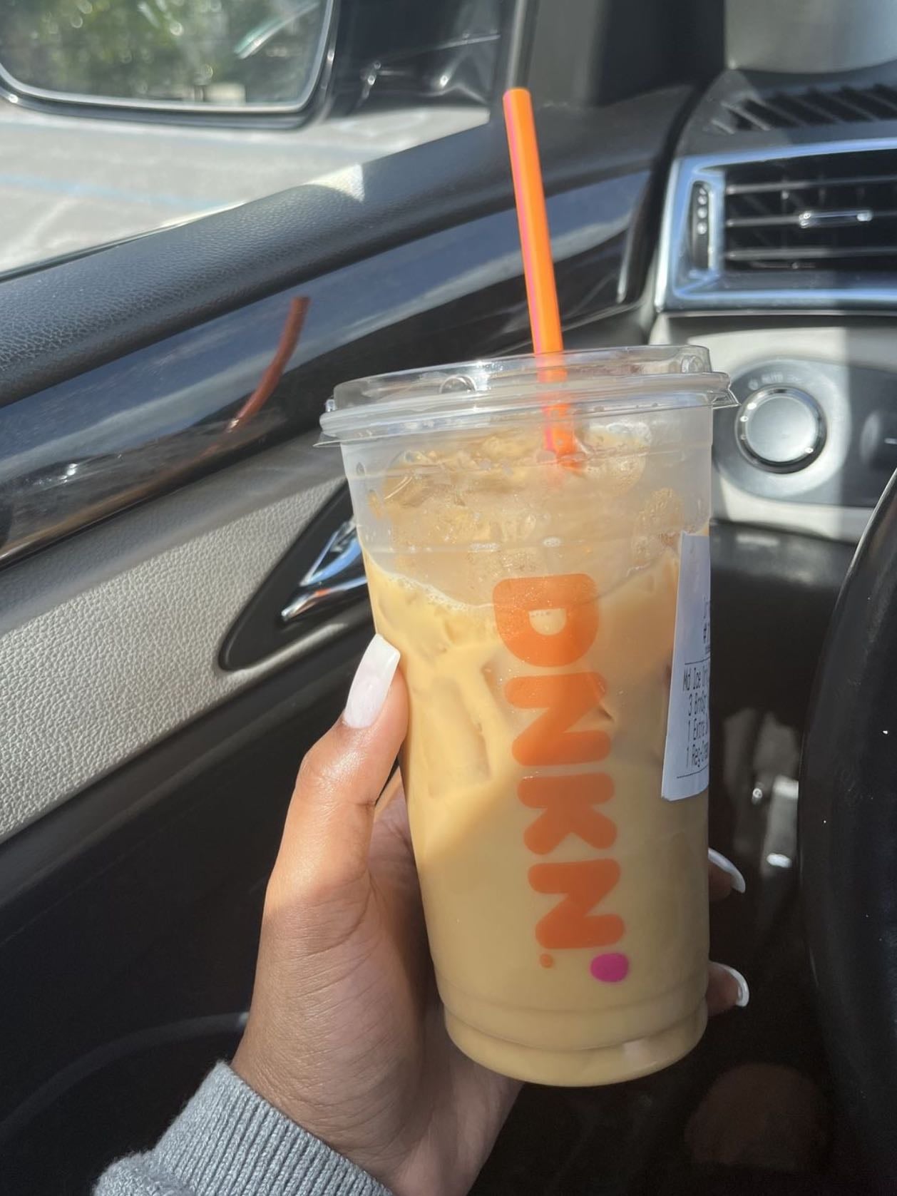 Dunkin - medium iced coffee 2 vanilla 3 caramel 3 cream 1 shot espresso