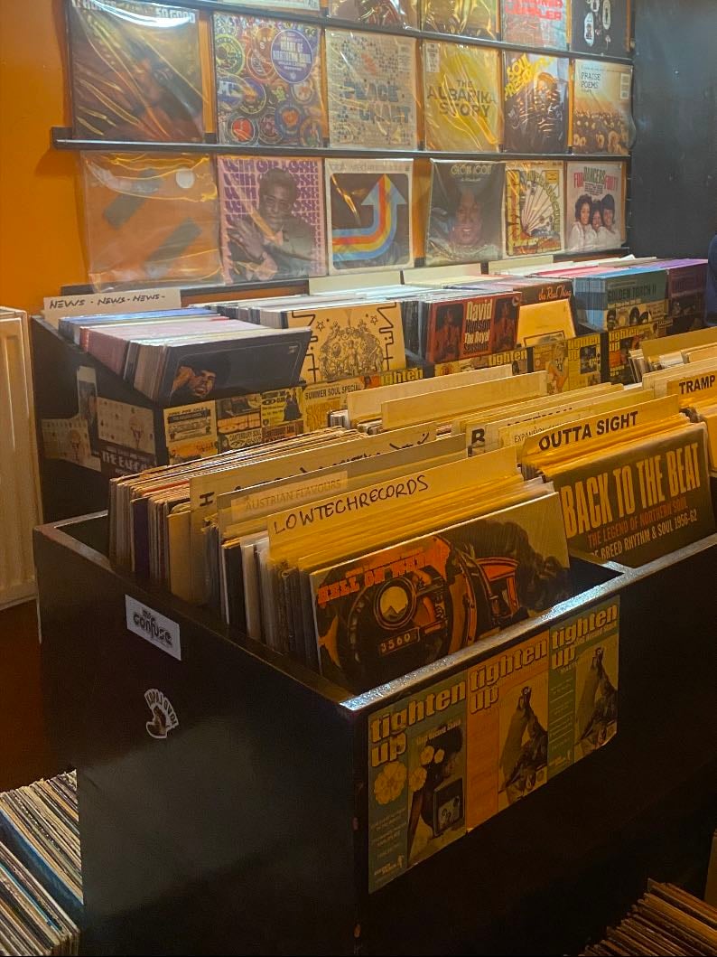 browsing in vinyl stores for hours