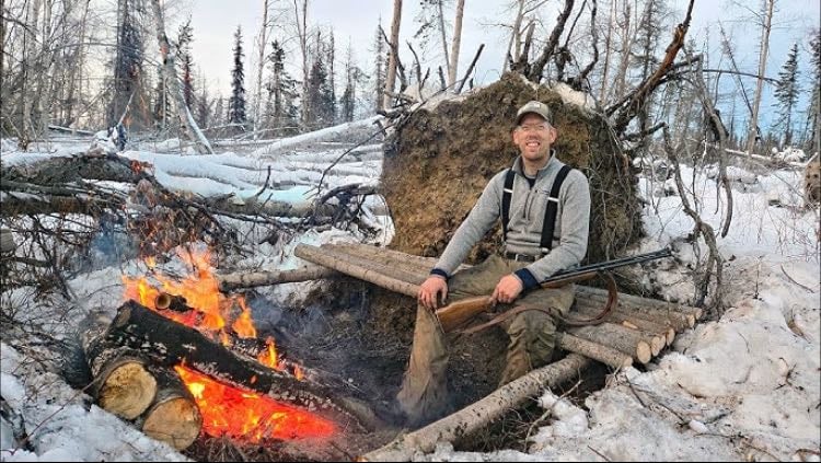 Watching survivalist camping ytb videos - <— love this guy