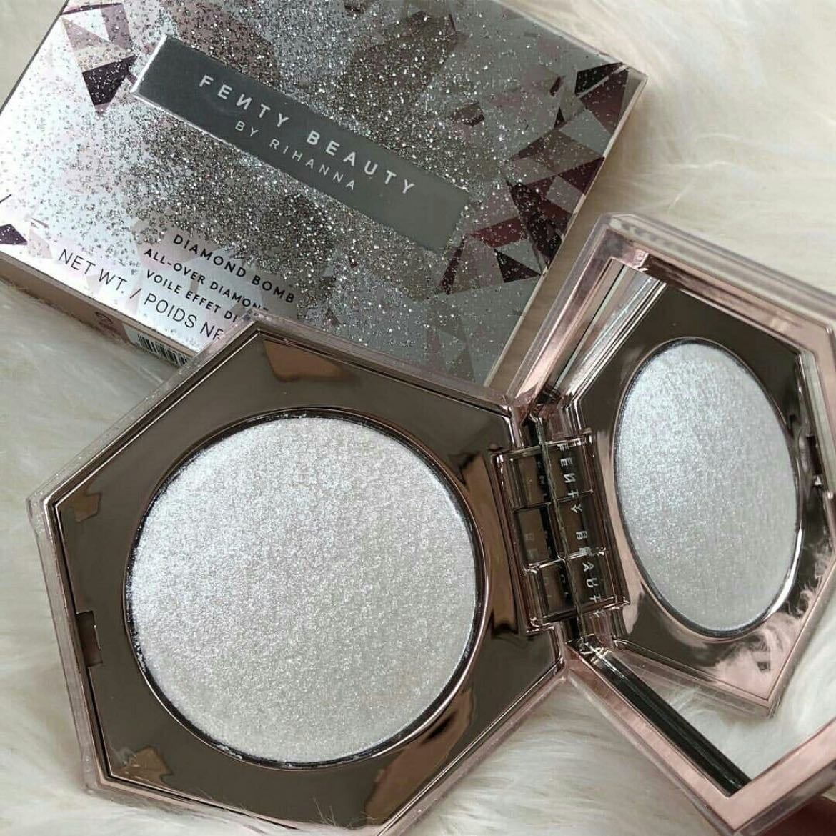 fenty diamond bomb highlighter - the perfect amount of sparkles and i use it as a body glitter as well.