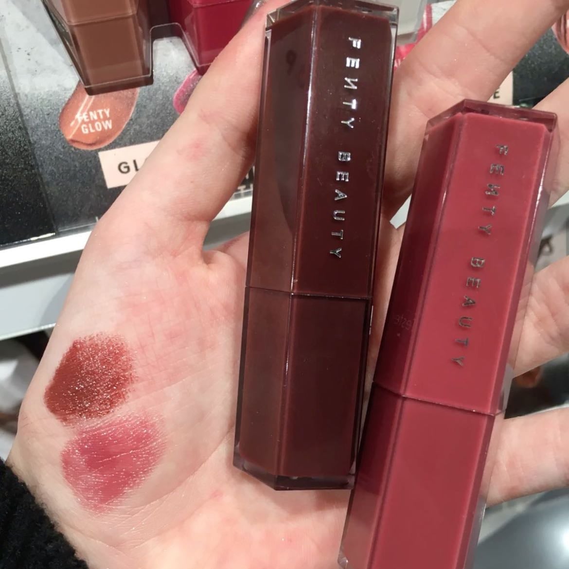 fenty gloss bomb stix - pigmented yet lightweight. not sticky at all. you can’t even tell it’s there + makes your lips look plumper.