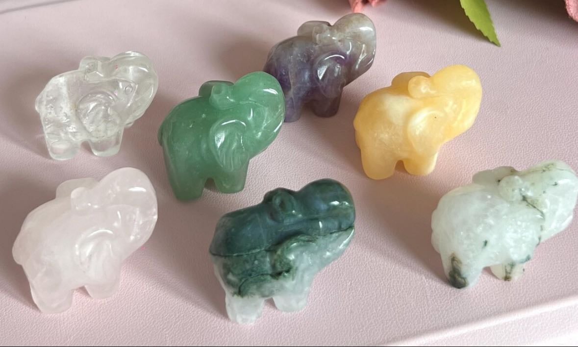 Carved crystal elephants - wisdomgracewitches