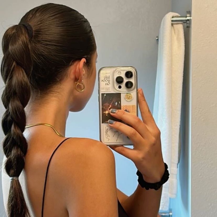 cola alta con trenza