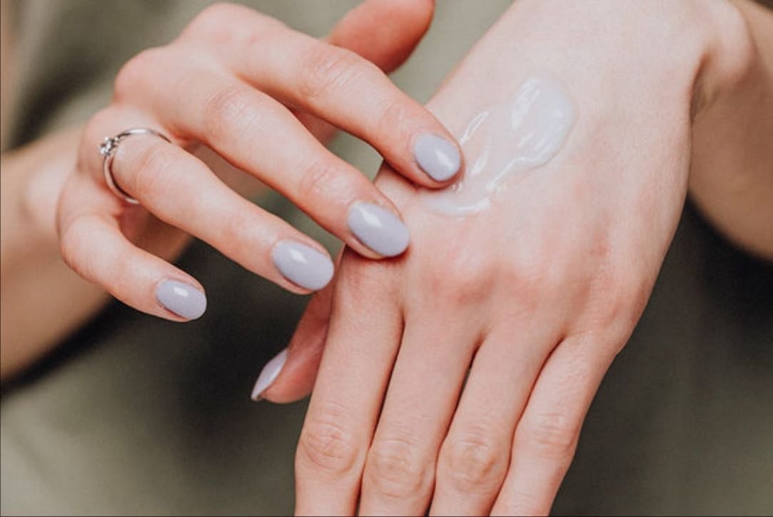 applying hand cream regularly