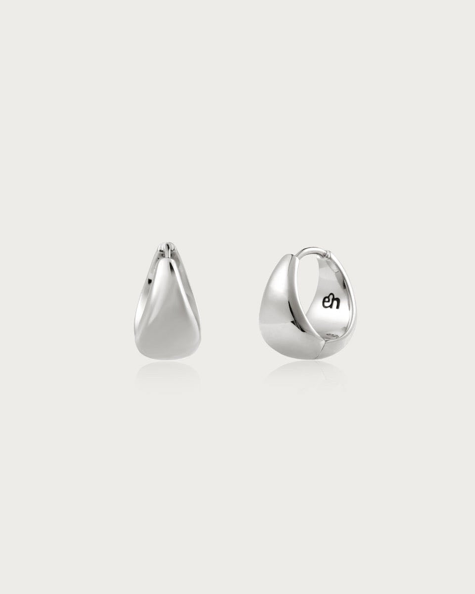 Silver Waterdrop Earrings
| En Route Jewelry | En Route Jewelry - Materials: rhodium plated brass Measurements: 17mm/0.67″ in diameter, 17mm/0.67″ in width.