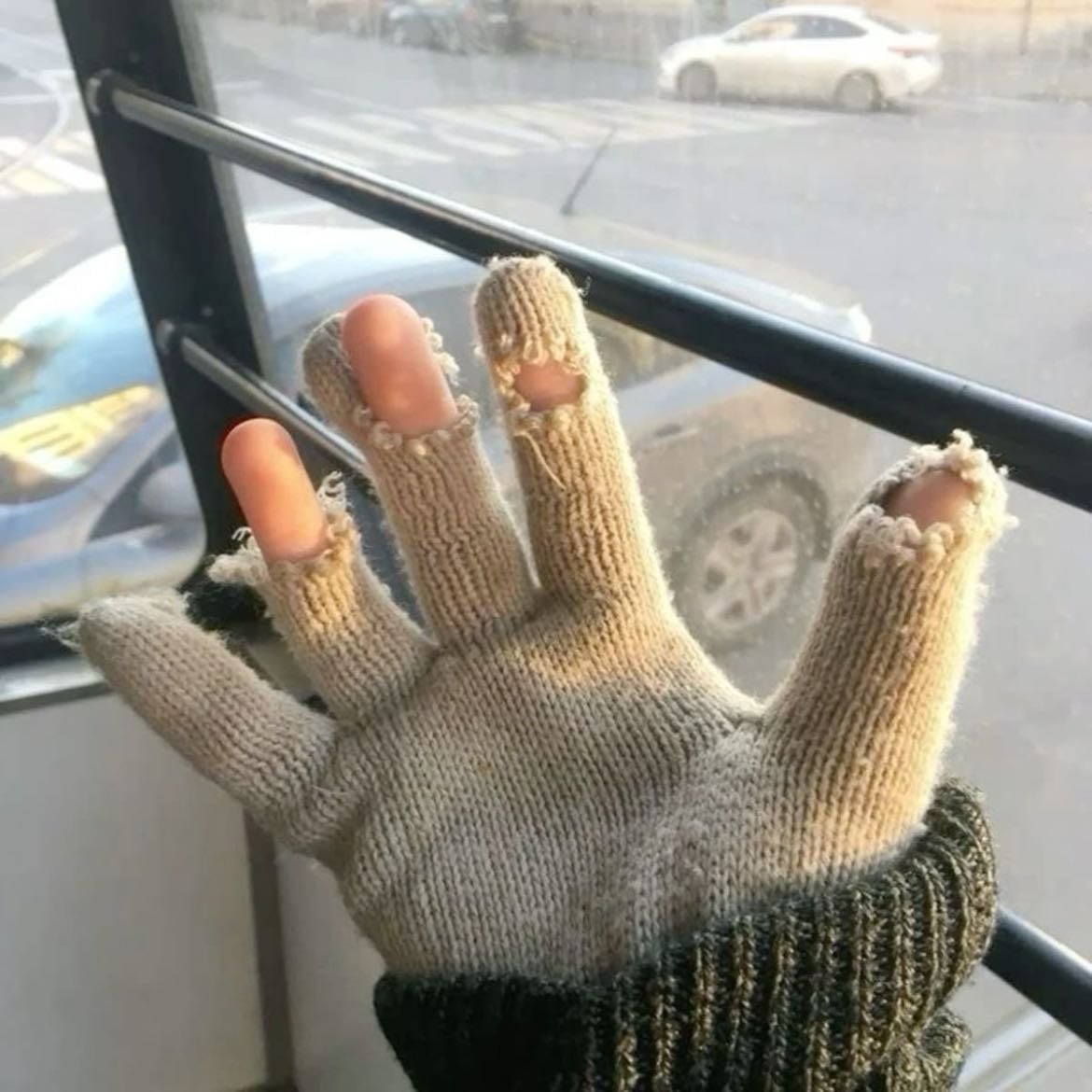 holes - all his socks and gloves end up with holes in them