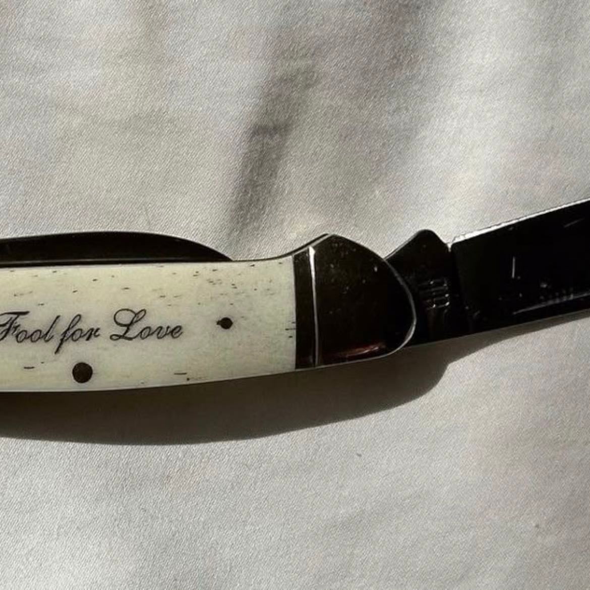 dagger - has a customized knife in her purse at all times