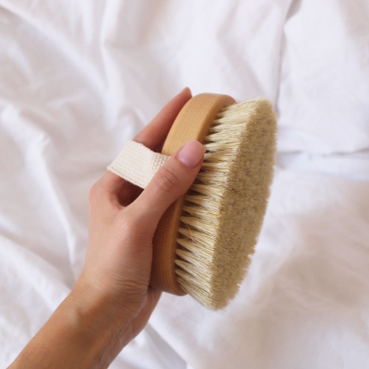 Dry brush - after lymphatic drainage massage and before shower