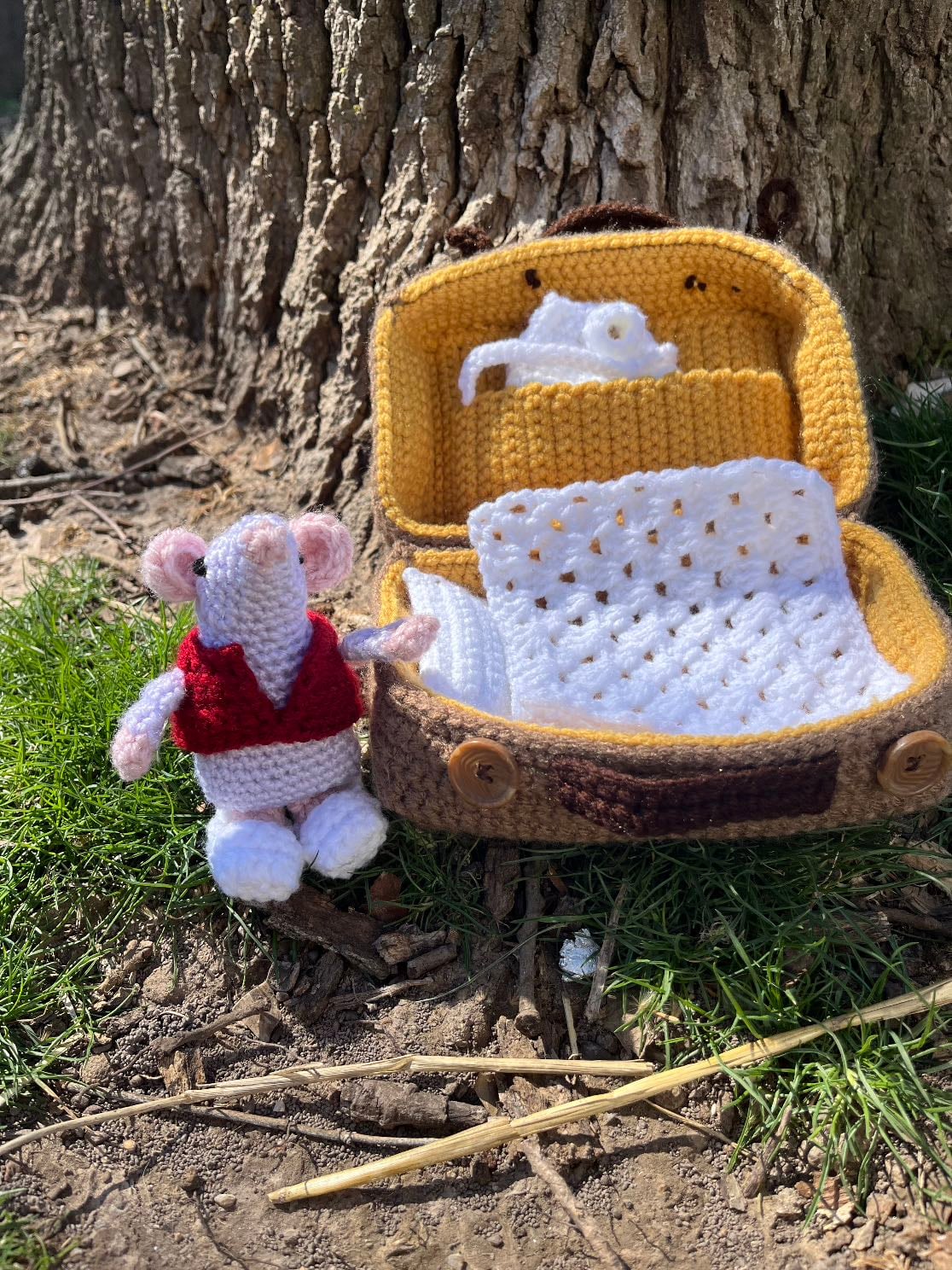Crochet mouse in a suitcase