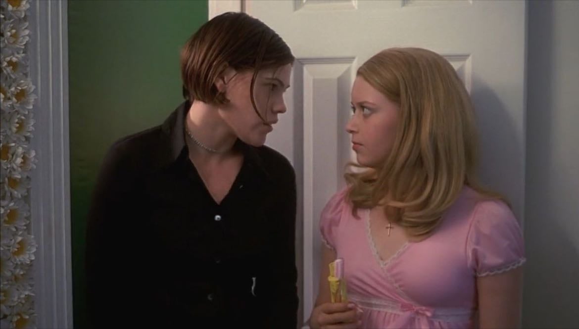 Megan & Graham - Naïve, bubbly, traditional cheerleader vs. Cynical, tough, rebellious tomboy