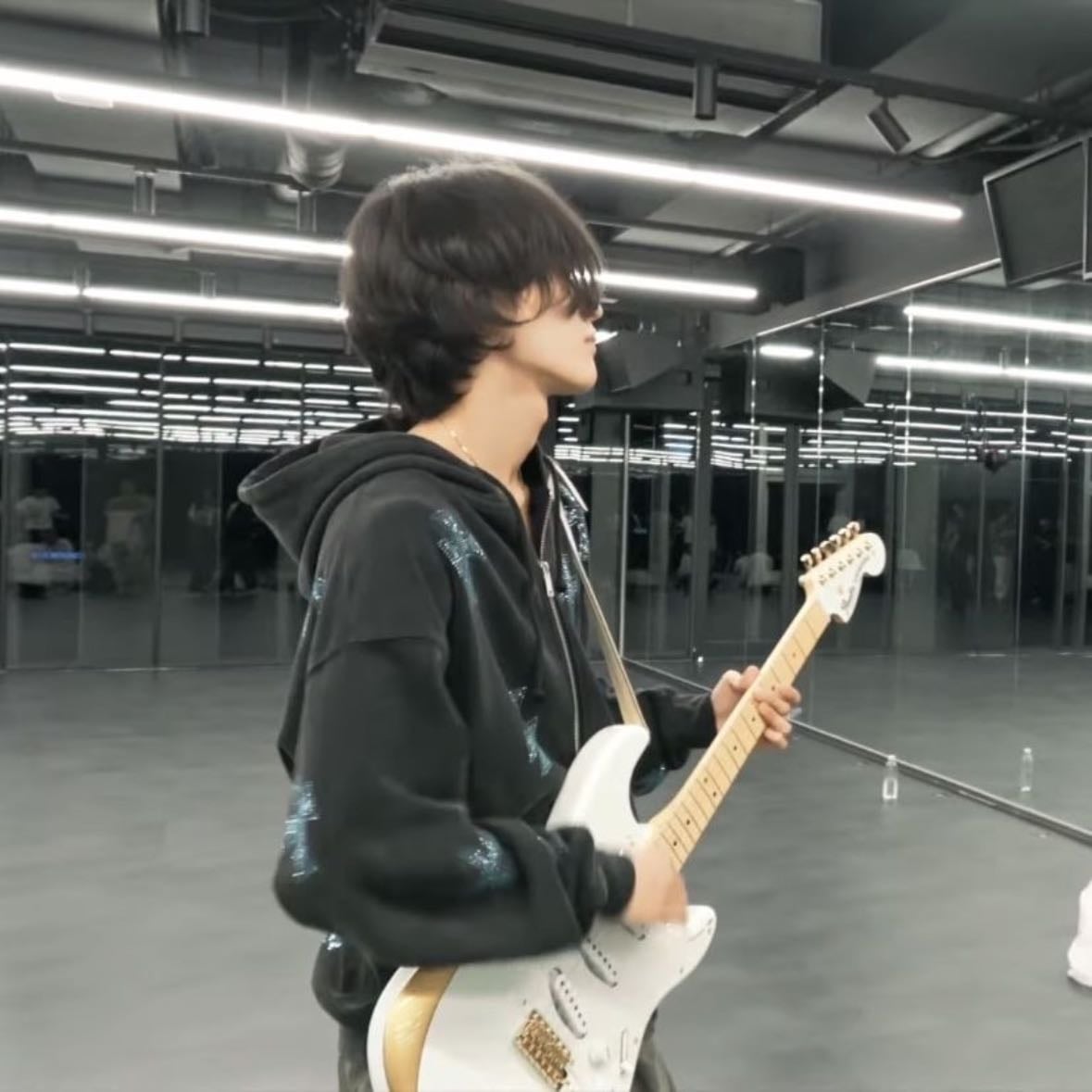 this specific pic too - guitarist wonbin is my roman empire