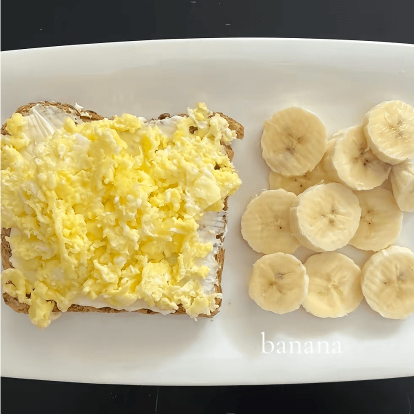 Slice of bread with egg and fruit - Fruit can vary for your preference