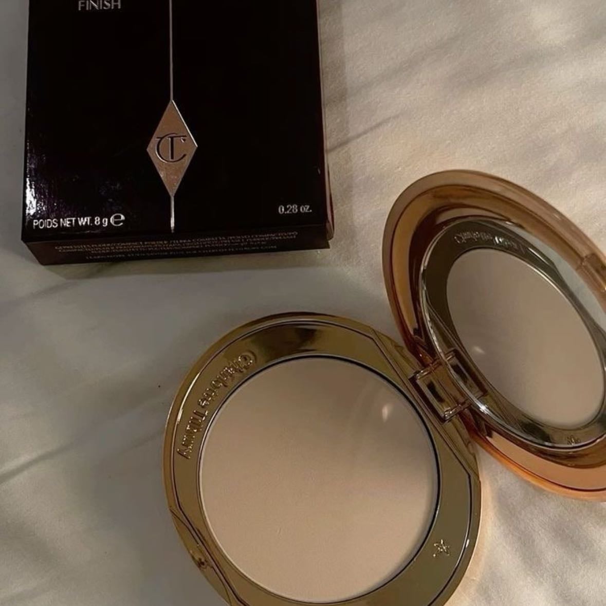 mini airbrush flawless finish setting powder - $28 charlotte tilbury, color “2 medium”