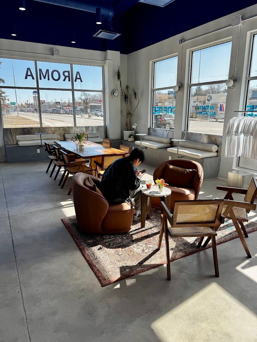 Aroma Alchemy Coffee - The interior is giving pool, I fear. Sour espresso but delish iced chai. I respect the Nutella croissant for sure. Very nice plates that fit the dark blue theme, but the seating is so bad. There’s only room for two people max at most spots.