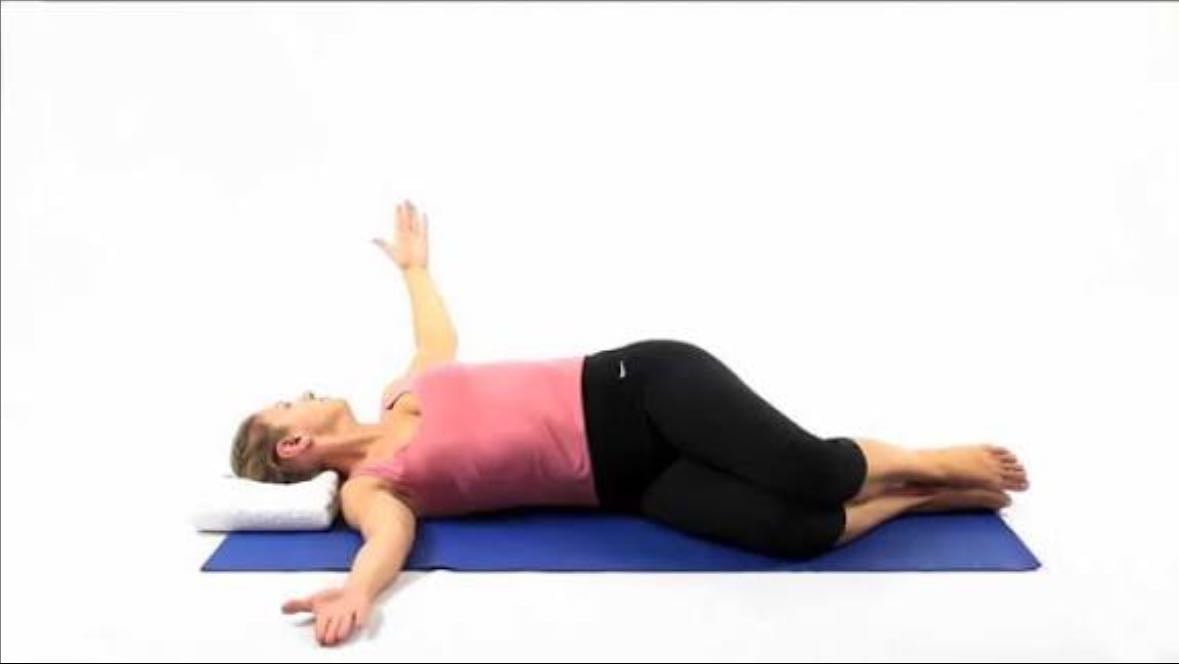 Arm Opening, 5x5 - Lie on your side, your head resting on a cushion, knees bent in at right angles, pelvis neutral. Lengthen both arms out in front of you, palms together. Raise the arm first towards the ceiling, and then as far back as you can towards the floor. As you take the arm up and back, make sure that you keep your pelvis still.