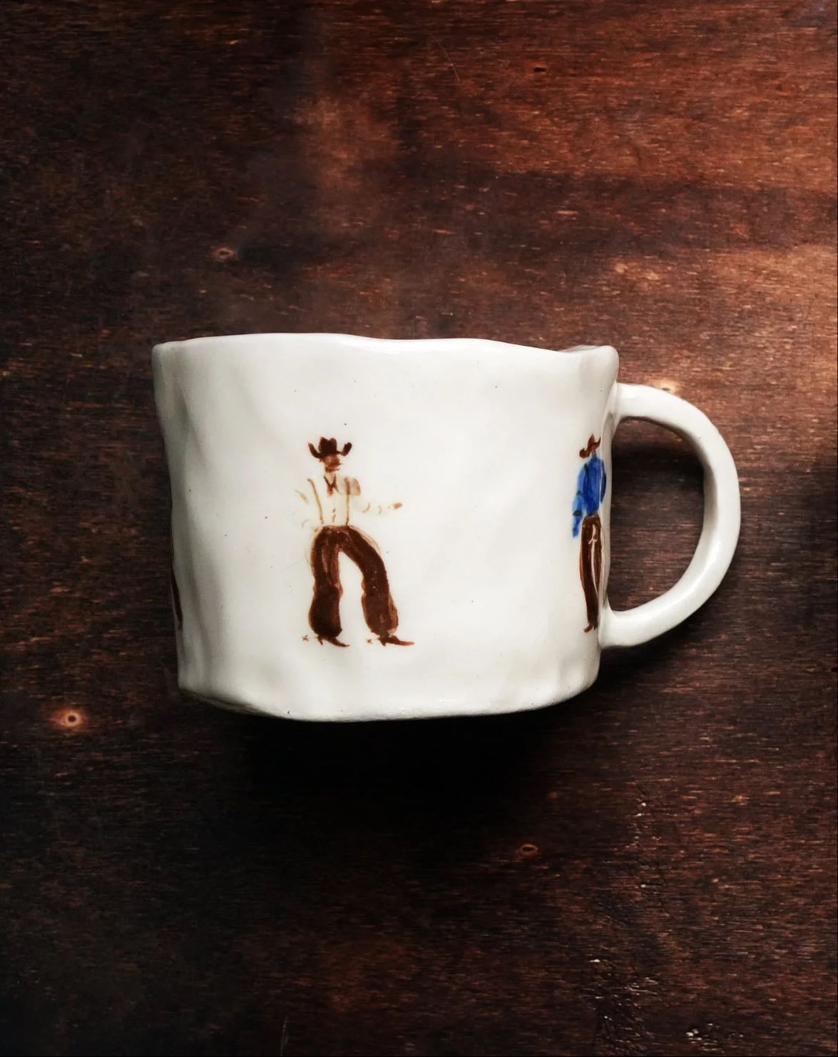 demure cowboy tea cup - curata