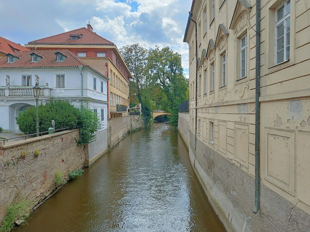 Čertovka canal - When you look at your tourist map of the city then find where the Charles Bridge crosses the river. On the Lesser Town side of the Charles Bridge you’ll find what seems to be a smaller river called the Čertovka Inlet (Devil’s Inlet). Where this inlet goes under Charles Bridge now goes by the popular name of Little Venice.