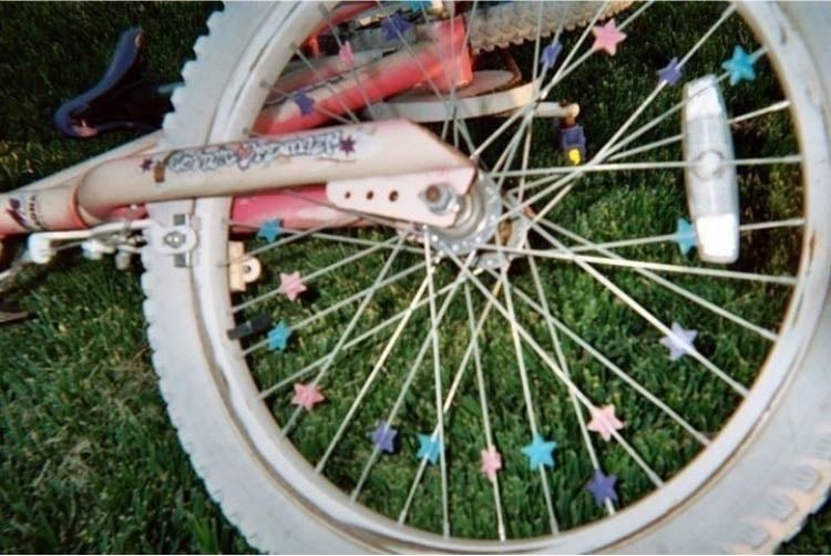 Riding my beautiful white and blue bike - I’m too big for it now