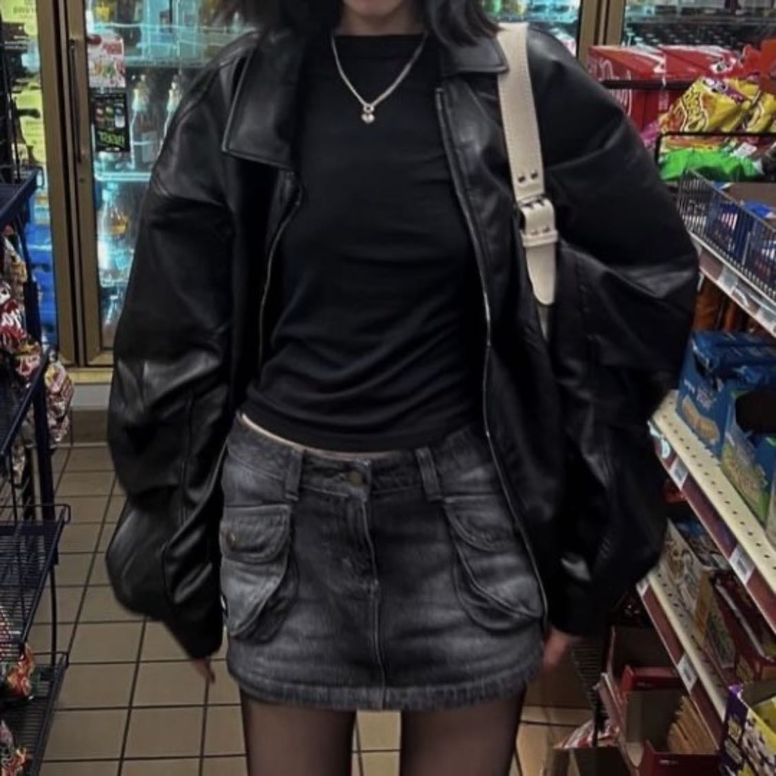 #10 - -black top, leather jacket, grey cargo skirt, tights, loafers