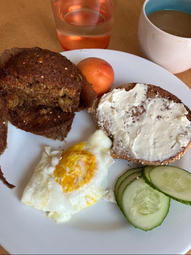 brunch assortment - 1/2 morning glory muffin, 1/2 bagel, egg, cucumber, apricot