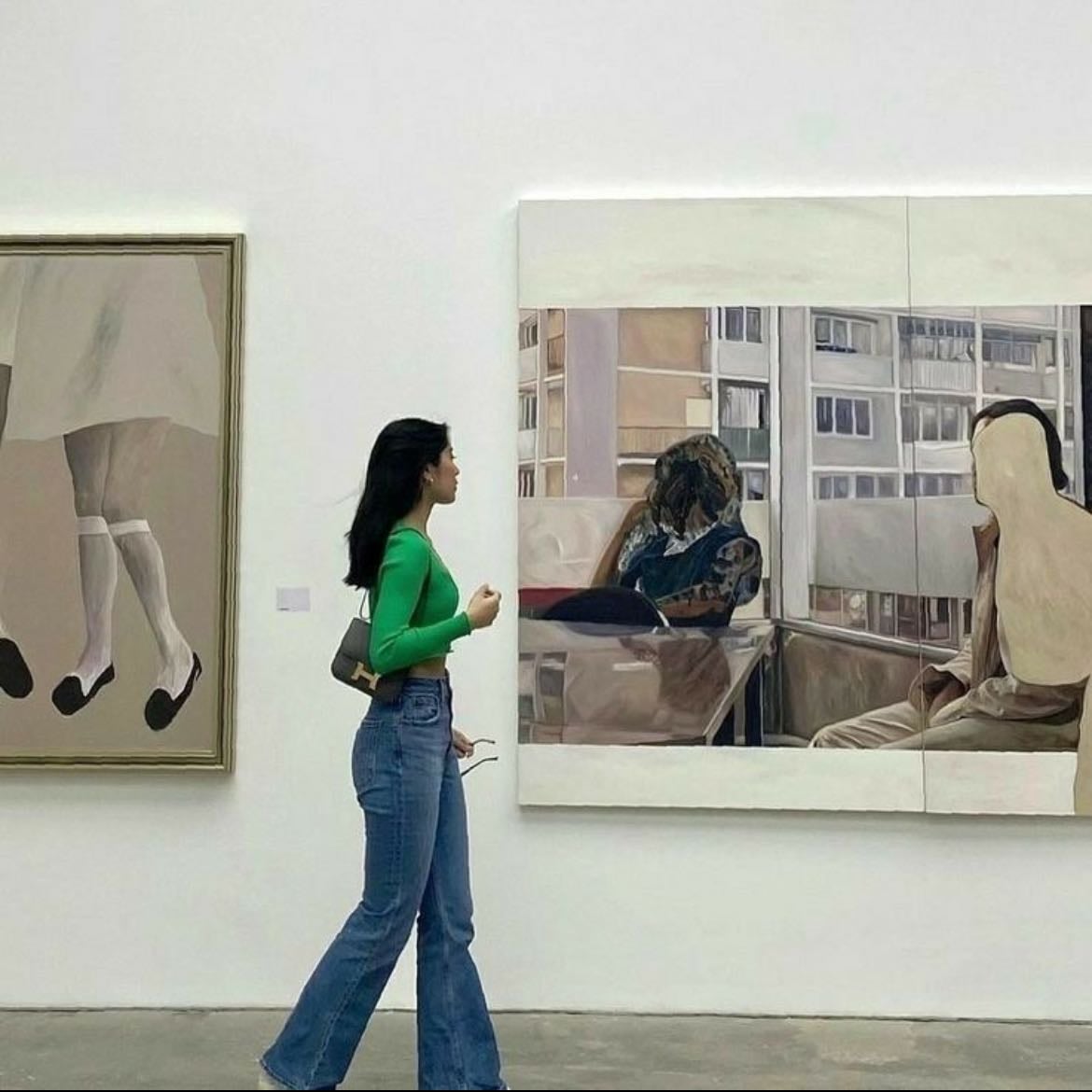 between two paintings