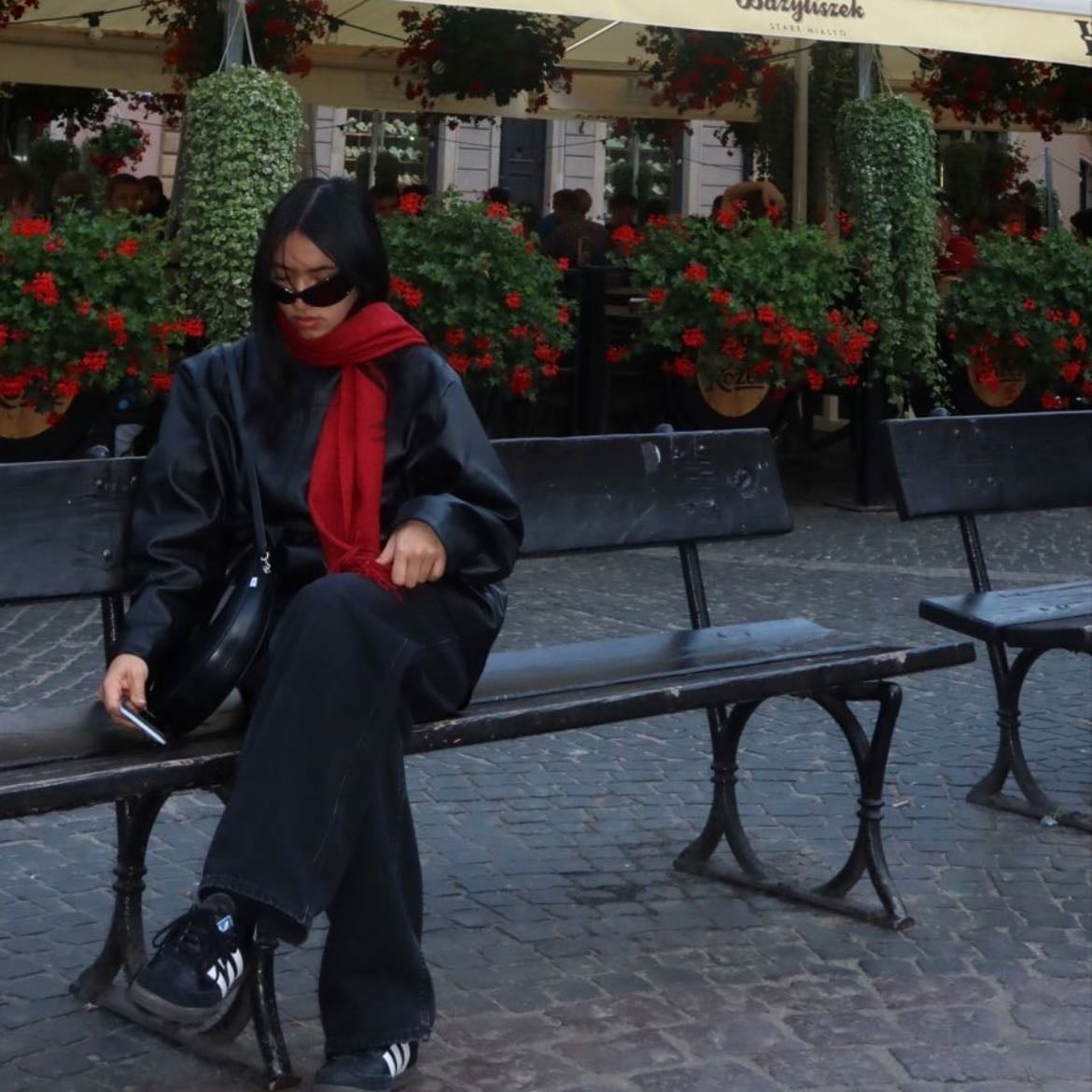 sit on a bench