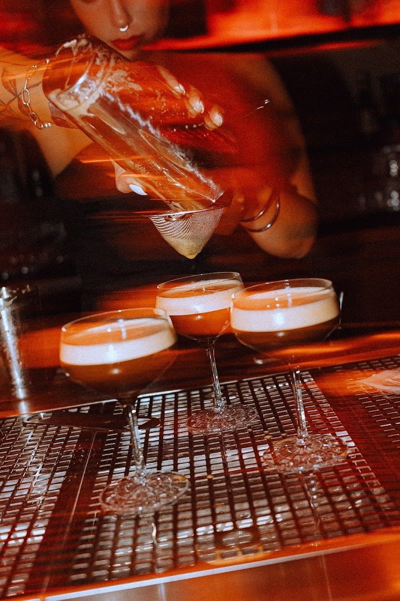 Bitter Priest Bar - red light interior cozy vibbey love the place after 11 go to crowd and dance
