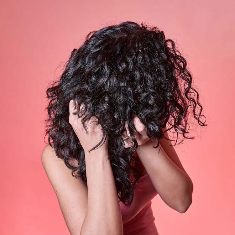 scrunch after cream - this is when you finger coil or brush style