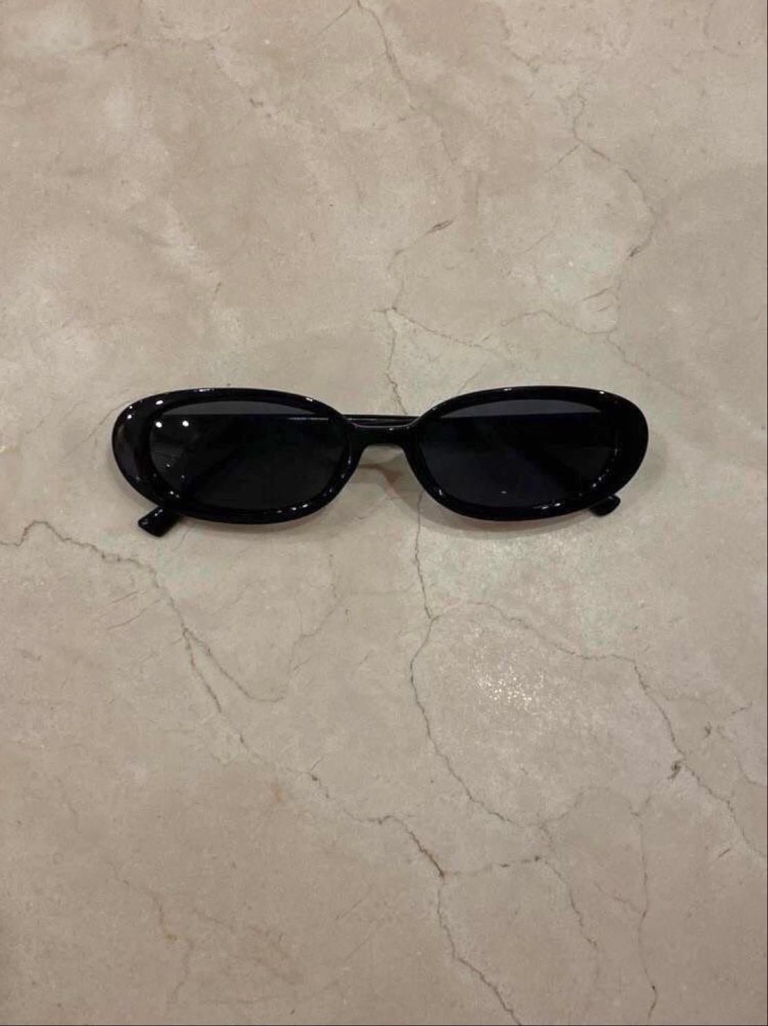 lentes de sol negros