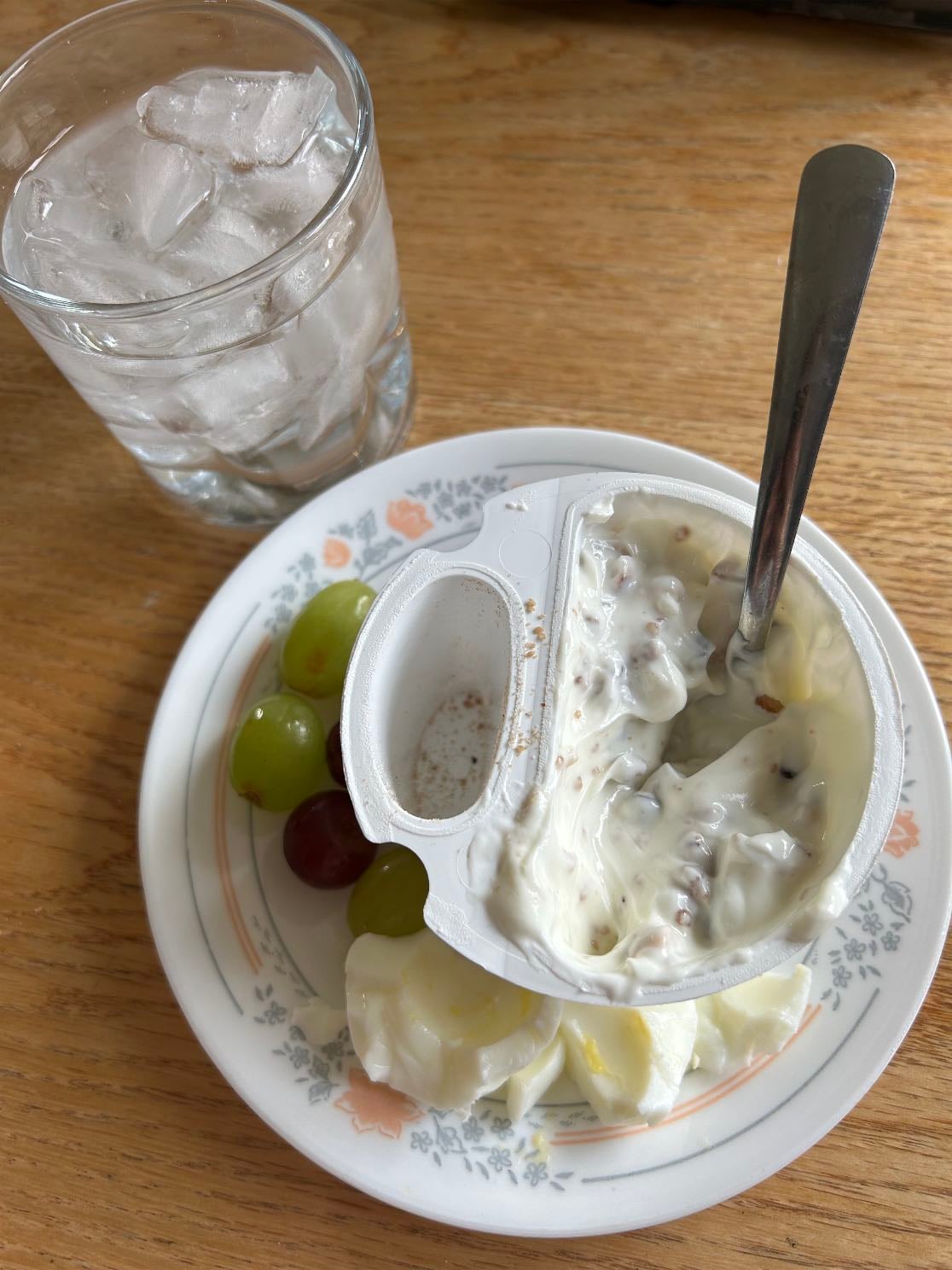 Breakfast - Greek yoghurt with nuts and chocolate chips, grapes and egg whites