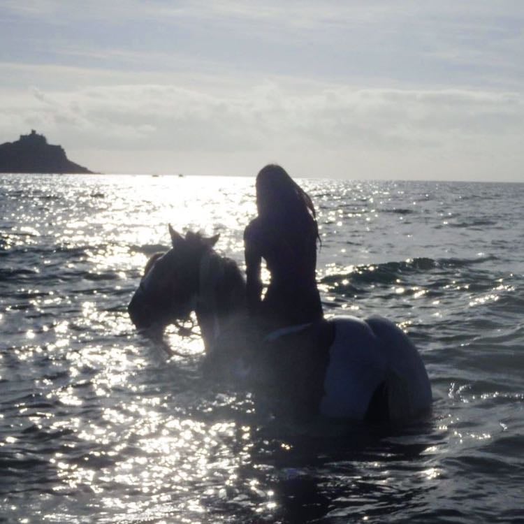 Cross a river on a horse