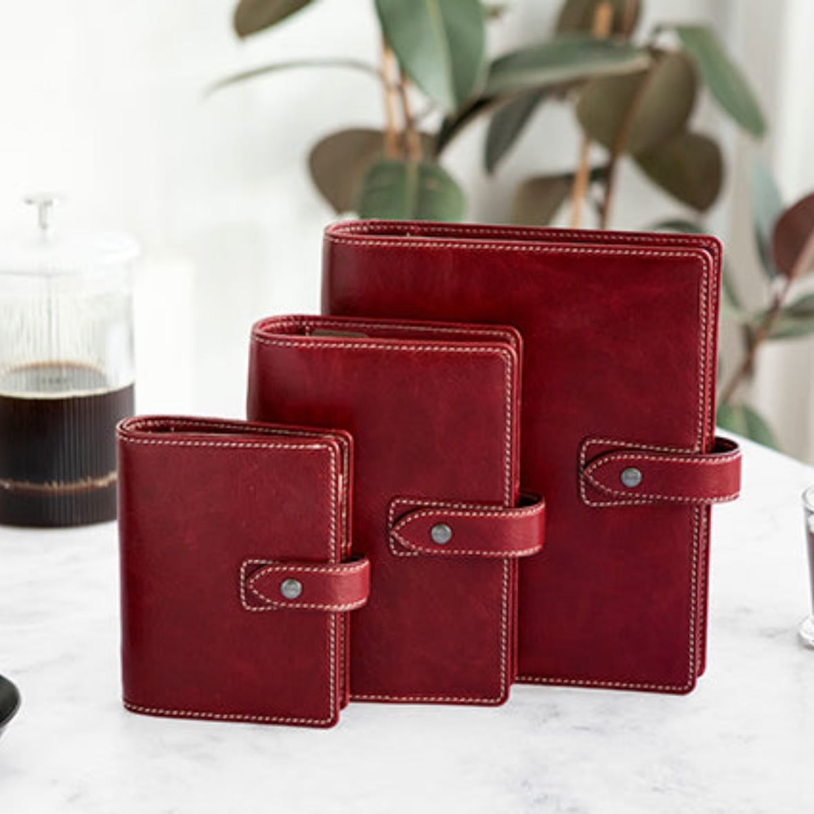 filofax notebook - size: personal, color: burgundy or dark brown