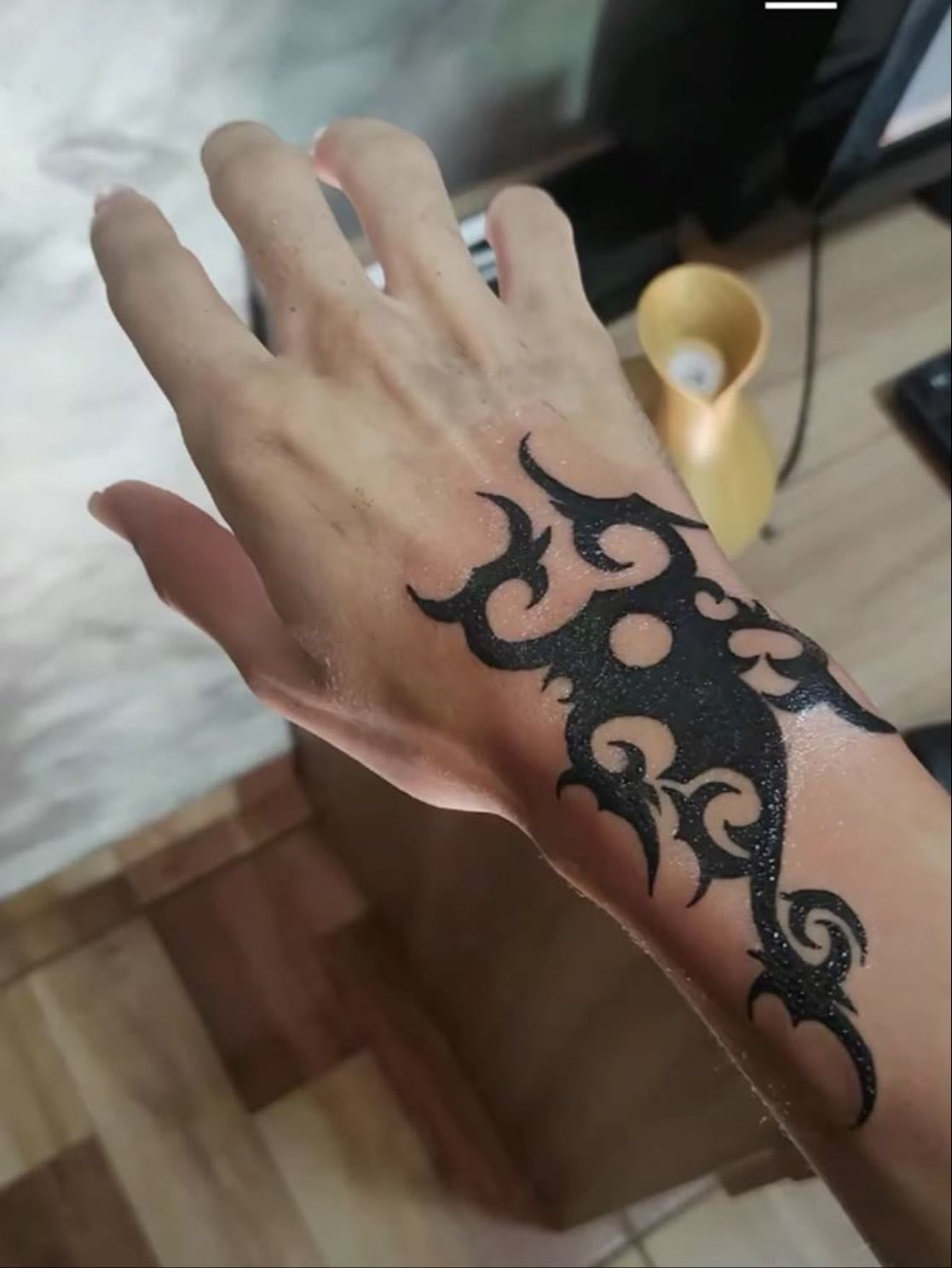 Jesse pinkman hand tattoo