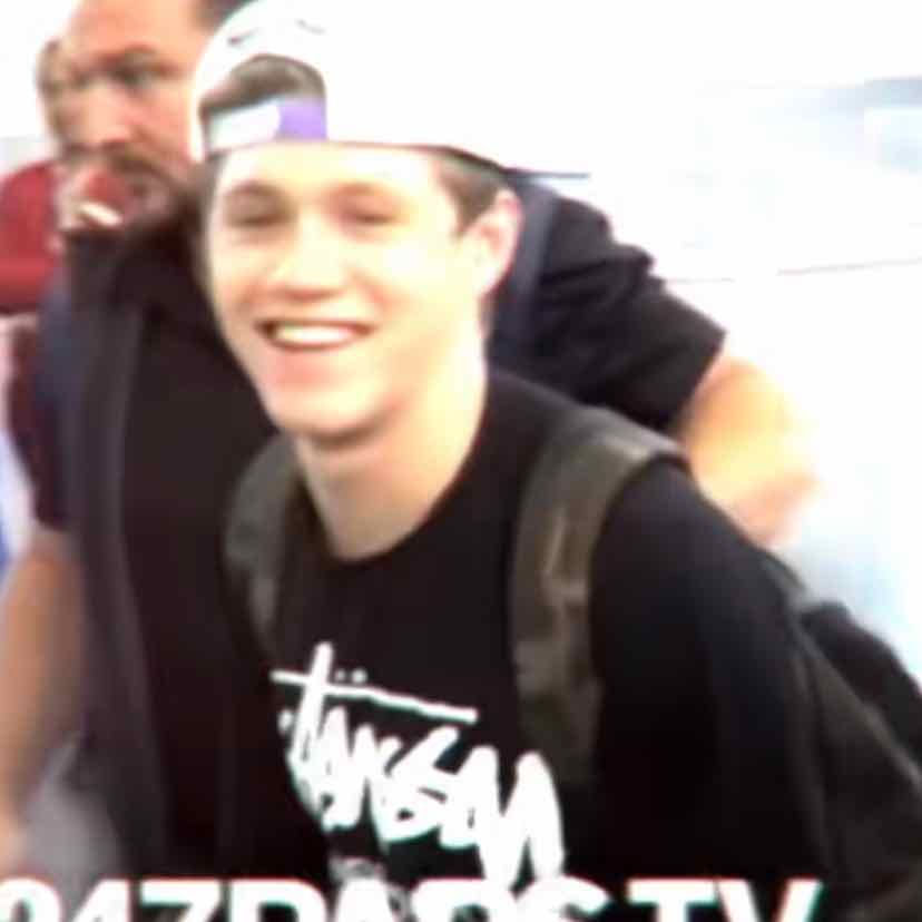 fbn in the airport cap on backwards