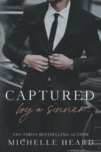 Captured By A Sinner (The Sinners Series) - Michelle Heard · 2022